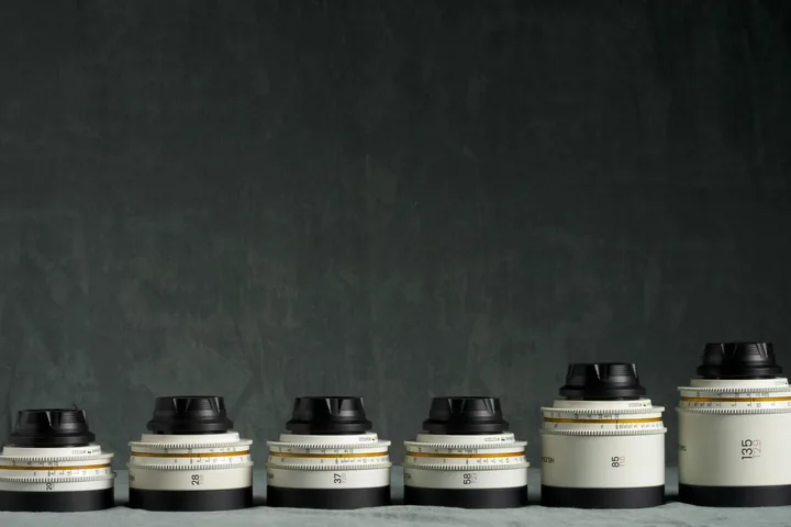 Six rehoused Iron Glass vintage primes in pale housings on the studio cloth.