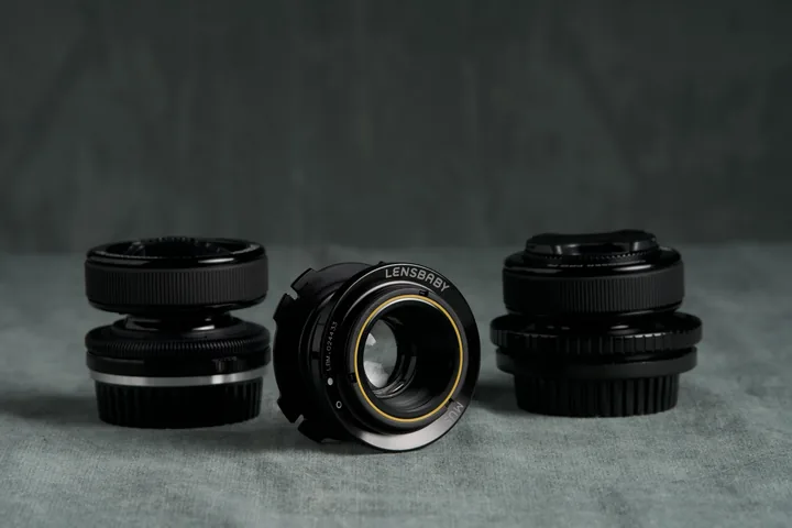 Lens Baby cinema line kit arranged on the studio cloth.