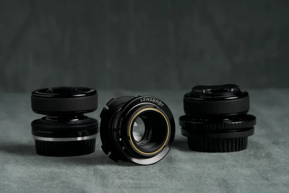 Lens Baby cinema line kit arranged on the studio cloth.